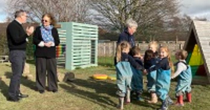 Children at village playgroup meet Welsh Government minister